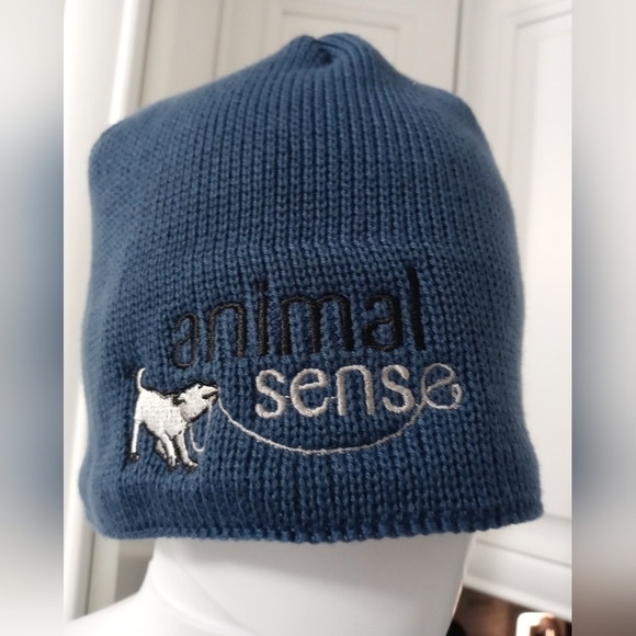 The North Face Navy Blue Knit Cap Hat w "ANIMAL SENSE" Embroidered on front NEW - Picture 1 of 6